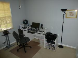 Example of a home computer station where an advanced power strip might be used with a computer, monitor, and speakers