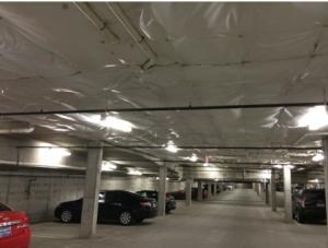 Right - Fiberglass/mineral wool insulation thermally isolates the garage from the interior occupied space above.