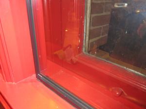 Interior storm window on double-hung original window