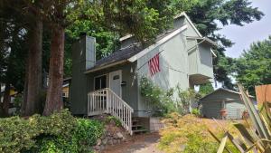 Wrong - The siding on the chimney is rotten because there is no metal step flashing at the base of the chimney.