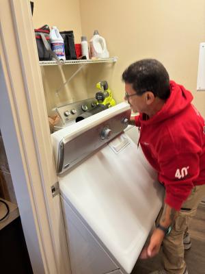 Move the dryer to access the dryer exhaust vent