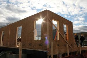 Structural insulated panels provide a continuous layer of insulation sandwiched between two continuous layers of OSB for thermal protection and sturdy construction.
