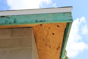 Right - An unvented attic with no soffit vents, borate-treated fascia board, metal drip edge, and concrete block construction on this south Florida home help make it resistant to hurricanes, pests, and wind-born wildfire embers.