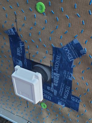 Right - External outlet wall penetration is flashed with tape that is properly layered with house wrap.