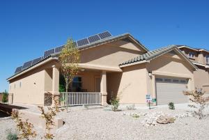 Deep overhangs and porches provide midday shade for most of the windows on this home in Albuquerque, NM.
