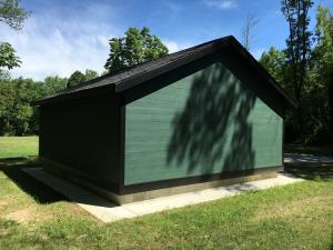 Concrete (4 inches thick at 5% slope) provides a pest-resistant perimeter around the foundation