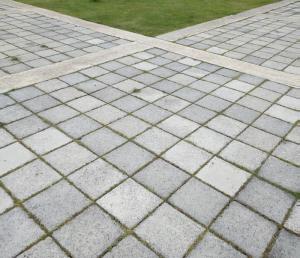 Porous surfaces like pavers allow water to pass through and percolate slowly into the soil 