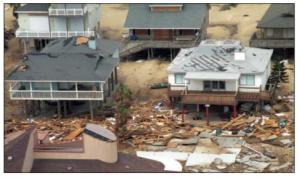 Porches and decks appear to be structurally sound after a hurricane despite damage to other portions of the houses. 