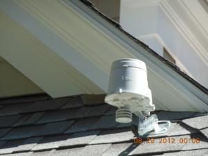 Right - A moisture sensor is installed on the roof to control the sprinkler system.