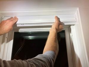 Press the blind assembly into the mounting brackets per manufacturer’s instructions.