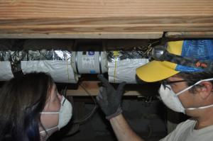 Right – a booster fan was installed in this long dryer duct to increase air flow and help prevent the duct from being clogged with lint