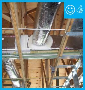 Right: Ductwork is installed in direct contact with lower truss cords. In this picture the main trunk is laying on the truss cords and branch ducts are temporarily held with strapping across truss cords. Ducts are well sealed with mastic