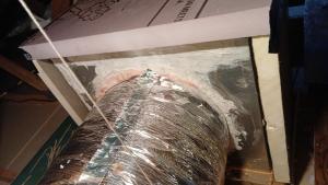 Rigid foam was used to insulate this return plenum attached to this flex duct.