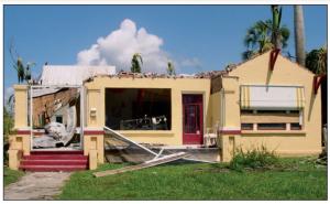 Failure of the wall to roof connection resulted in loss of roof under hurricane force winds.