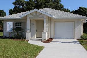 This highly efficient 1,290-ft2 home by Habitat for Humanity of South Sarasota County, Florida, is built to the requirements of the U.S. Department of Energy (DOE) Zero Energy Ready Home program and has low utility bills of about $72 per month.