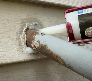 Seal gaps around pipes and wiring with caulk or spray foam from the outside to prevent water and air from entering 