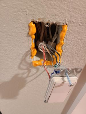 Allow sealant around the electrical switch box to fully cure before reinstalling.