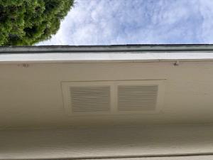 This is a soffit vent; it provides ventilation for a vented attic
