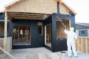 This asphalt-based, vapor-permeable coating is painted directly onto the OSB sheathing to provide a weather-resistant barrier that also reduces air leakage.