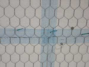 Right: All joints in the rigid foam are taped to keep stucco out of joints for even drying. Mesh tape (shown here) is used with expanded polystyrene (EPS); acrylic sheathing tape or self-adhered membrane is used with XPS