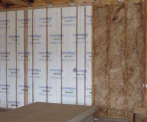 This hot climate zone home uses high quality batt insulation between studs to insulate this connecting garage wall. 