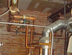 Uninsulated hot water heating pipes