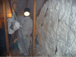 The attic kneewall and the open floor cavities under kneewall are both sealed and insulated in one step with spray foam insulation