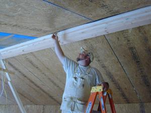 Use a smoke pencil to check for air leaks at SIP panel seams, especially along the ridge beam