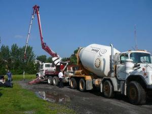 ICF forms are filled with the use of a concrete pumper truck
