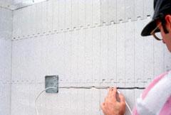 Utilities are commonly recessed into cutouts in the foam after concrete has been poured