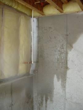 Because the above-grade potions of the wall lack exterior insulation, condensation and even ice form during cold winter conditions