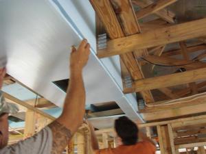 Install bottom layer of rigid insulation