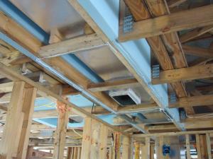 Prepare chase with adhesive for bottom insulation