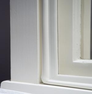 Interior removable storm windows should fit snuggly into the window frame