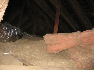 Wrong - Batt insulation does not provide complete coverage across the attic floor so ceiling joists are exposed resulting in thermal bridging.