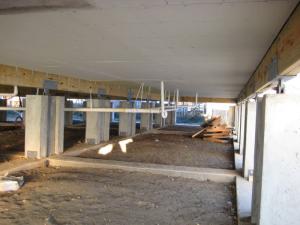 The application of intumescent coating/protection layer protects this elevated floor system from below.