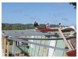 Wrong - This roof failed in high winds due to lack of metal attachments to the framing.