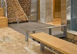 Tile flooring will provide higher thermal mass than wooden or laminate flooring 