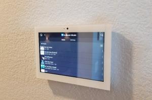 Example of a touchscreen control interface that allows a resident to adjust the lighting and integrate other home technologies, such as a security system or sound system