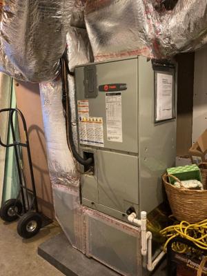 This traditional centrally ducted heat pump heats and cools the entire home through a network of ducts.