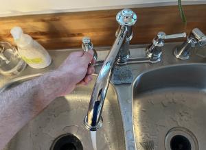 Turn a fixture on in the hot-water-only position prior to draining the water heater tank.