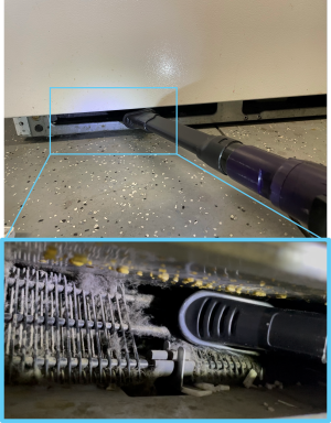 Use a vacuum with a brush attachment to reach condenser coils located underneath the refrigerator 