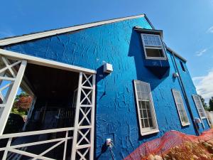 Wrong - Self-adhered house wrap is poorly installed with many bubbles and gaps at seams.
