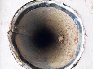Wrong - Vent hole has no cover or screening and is poorly sealed and flashed to siding.