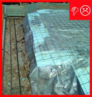 Wrong – Polyethylene sheeting does not completely cover the aggregate and the footing