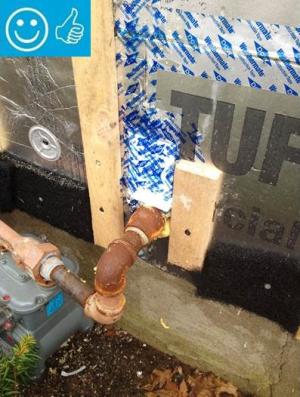 Right - The pipe penetration is properly flashed and furring strips are installed on each side in preparation for installing cladding