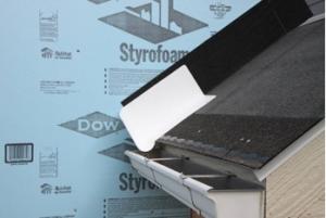 Step 2. Install shingle starter strip then kick-out diverter as first piece of step flashing.