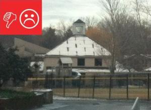 Wrong - The roof insulation panels for this building were not installed in multiple layers with joints offset. The snow melt pattern shows thermal bypasses at the insulation panel joints. 