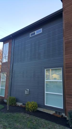Wrong - Dark pattern on wall is showing where warm air is leaking into the wall cavity from interior of home.