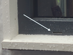 Window weep holes, located on the exterior at the bottom of the window frame, ensure proper drainage and prevent water infiltration.